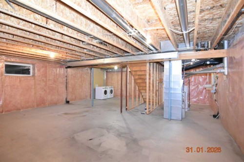 78 Somerglen Way Sw, Calgary, AB - Indoor Photo Showing Basement