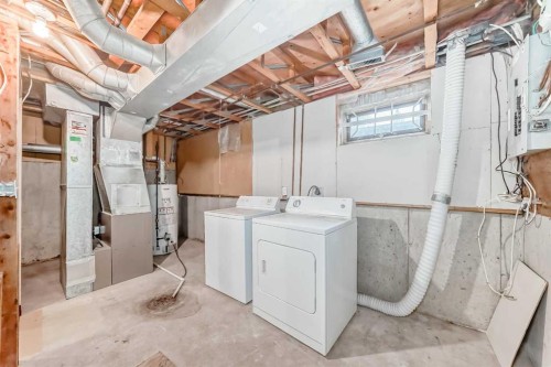 #11-380 Bermuda Drive Nw, Calgary, AB - Indoor Photo Showing Laundry Room