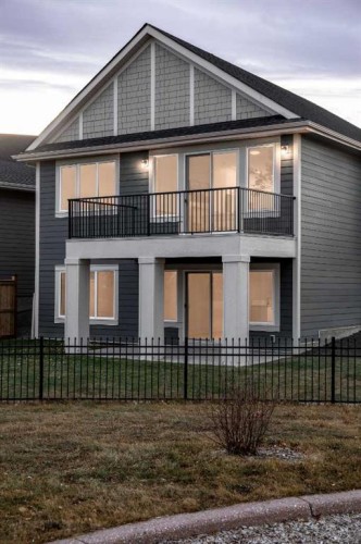 88 Sunrise Heath, Cochrane, AB - Outdoor With Deck Patio Veranda