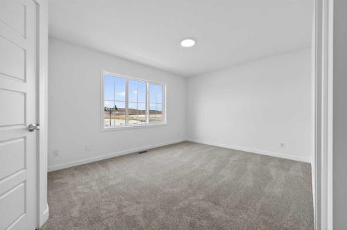 64 Creekside Drive Sw, Calgary, AB - Indoor Photo Showing Other Room
