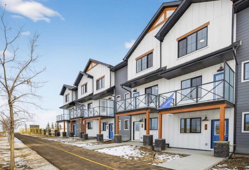 64 Creekside Drive Sw, Calgary, AB - Outdoor With Facade