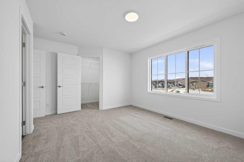 64 Creekside Drive Sw, Calgary, AB - Indoor Photo Showing Other Room