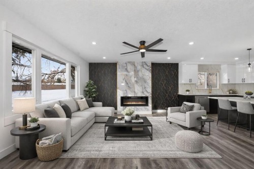 432 Ogden Drive Se, Calgary, AB - Indoor Photo Showing Living Room With Fireplace
