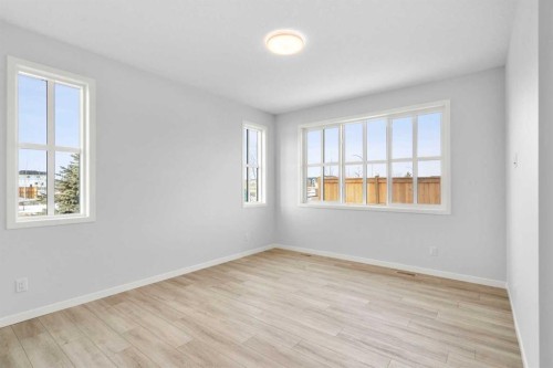 659 Buffaloberry Manor Se, Calgary, AB - Indoor Photo Showing Other Room