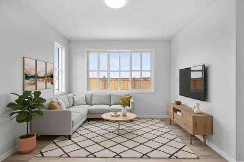 659 Buffaloberry Manor Se, Calgary, AB - Indoor Photo Showing Living Room