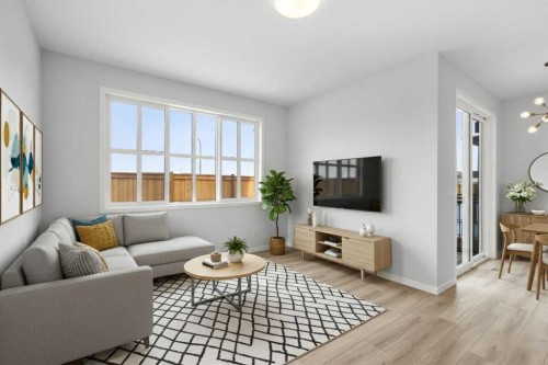 659 Buffaloberry Manor Se, Calgary, AB - Indoor Photo Showing Living Room