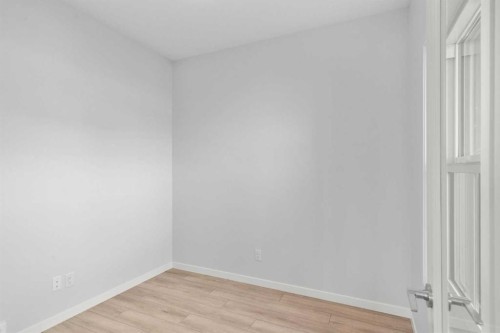 659 Buffaloberry Manor Se, Calgary, AB - Indoor Photo Showing Other Room