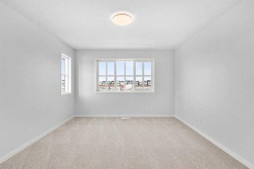 659 Buffaloberry Manor Se, Calgary, AB - Indoor Photo Showing Other Room