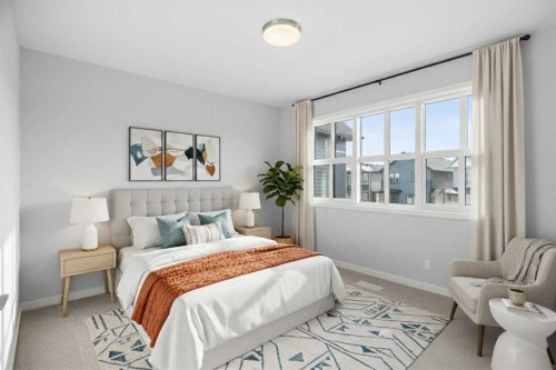 659 Buffaloberry Manor Se, Calgary, AB - Indoor Photo Showing Bedroom