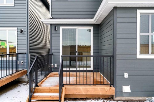 659 Buffaloberry Manor Se, Calgary, AB - Outdoor With Deck Patio Veranda With Exterior