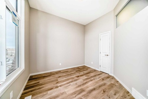 123 Sawgrass Gate Nw, Airdrie, AB - Indoor Photo Showing Other Room