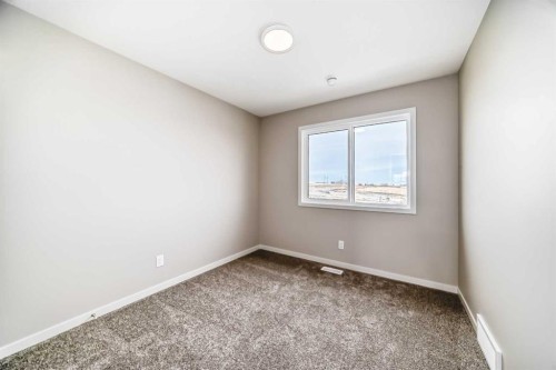 123 Sawgrass Gate Nw, Airdrie, AB - Indoor Photo Showing Other Room