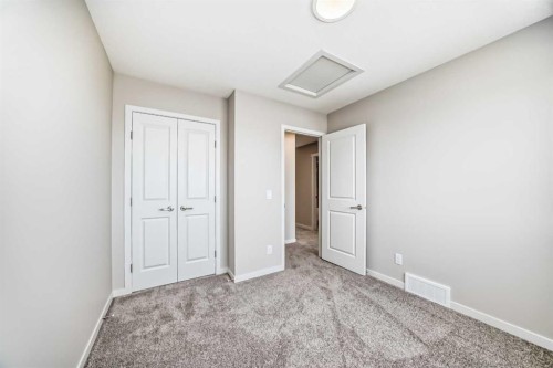 123 Sawgrass Gate Nw, Airdrie, AB - Indoor Photo Showing Other Room