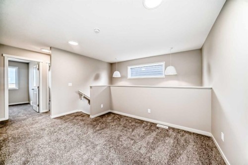 123 Sawgrass Gate Nw, Airdrie, AB - Indoor Photo Showing Other Room