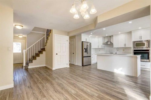 83 Hawkfield Crescent Nw, Calgary, AB - Indoor Photo Showing Kitchen With Stainless Steel Kitchen With Double Sink