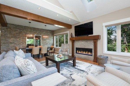 664 29 Avenue Nw, Calgary, AB - Indoor Photo Showing Living Room With Fireplace