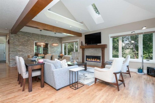 664 29 Avenue Nw, Calgary, AB - Indoor Photo Showing Living Room With Fireplace