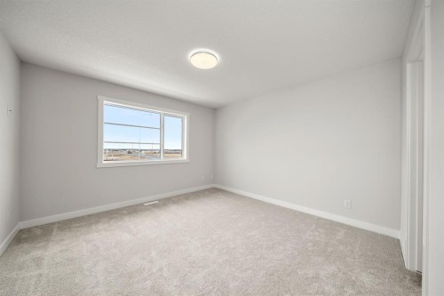 17 Sora Gate Se, Calgary, AB - Indoor Photo Showing Other Room