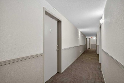 4316-10 Prestwick Bay Se, Calgary, AB - Indoor Photo Showing Other Room