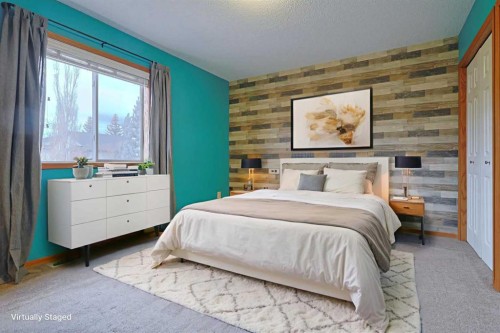 19 Sunridge Crescent Nw, Airdrie, AB - Indoor Photo Showing Bedroom