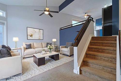 19 Sunridge Crescent Nw, Airdrie, AB - Indoor Photo Showing Living Room