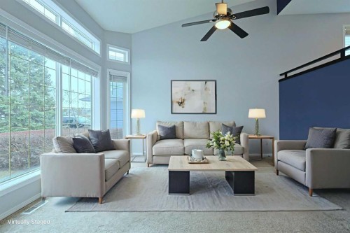 19 Sunridge Crescent Nw, Airdrie, AB - Indoor Photo Showing Living Room