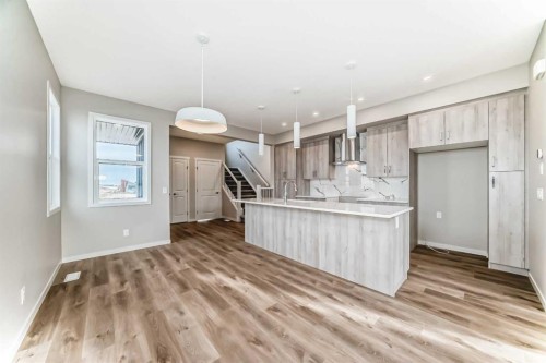 103 Sawgrass Gate Nw, Airdrie, AB - Indoor Photo Showing Kitchen With Upgraded Kitchen