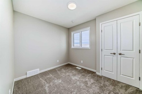 103 Sawgrass Gate Nw, Airdrie, AB - Indoor Photo Showing Other Room