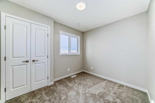 103 Sawgrass Gate Nw, Airdrie, AB - Indoor Photo Showing Other Room