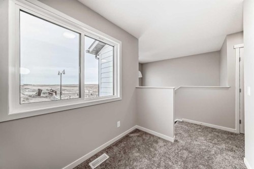 103 Sawgrass Gate Nw, Airdrie, AB - Indoor Photo Showing Other Room