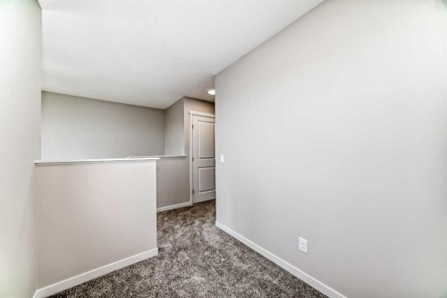 103 Sawgrass Gate Nw, Airdrie, AB - Indoor Photo Showing Other Room