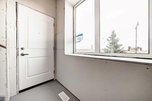 103 Sawgrass Gate Nw, Airdrie, AB - Indoor Photo Showing Other Room