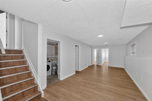 247 Taracove Estate Drive Ne, Calgary, AB - Indoor Photo Showing Other Room
