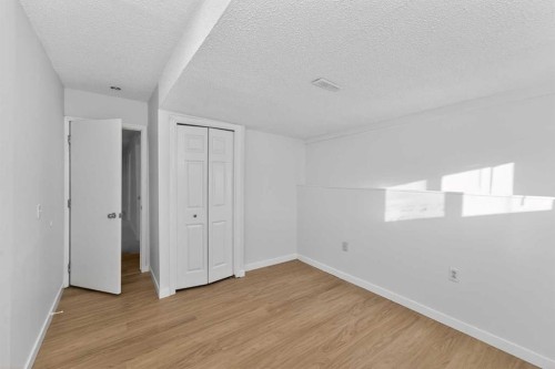 247 Taracove Estate Drive Ne, Calgary, AB - Indoor Photo Showing Other Room