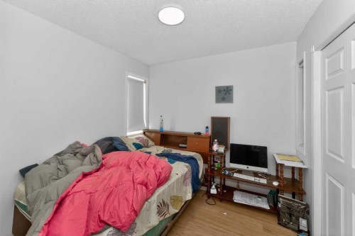 247 Taracove Estate Drive Ne, Calgary, AB - Indoor Photo Showing Bedroom