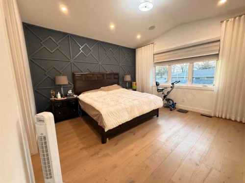 103 Hartford Road Nw, Calgary, AB - Indoor Photo Showing Bedroom