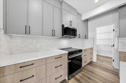 3 Lakewood Point, Strathmore, AB - Indoor Photo Showing Kitchen With Upgraded Kitchen