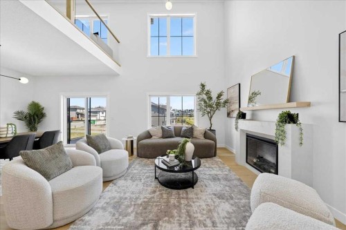 7 Lakewood Point, Strathmore, AB - Indoor Photo Showing Living Room With Fireplace
