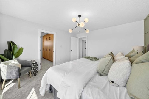 7 Lakewood Point, Strathmore, AB - Indoor Photo Showing Bedroom