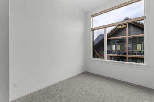 407-1505 Spring Creek Gate, Canmore, AB - Indoor Photo Showing Other Room