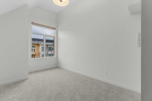 407-1505 Spring Creek Gate, Canmore, AB - Indoor Photo Showing Other Room