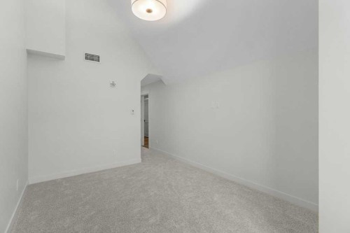 407-1505 Spring Creek Gate, Canmore, AB - Indoor Photo Showing Other Room