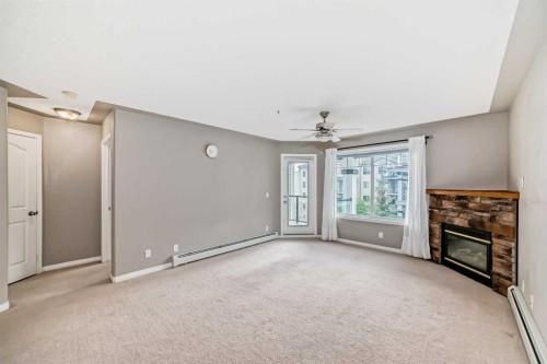 303-369 Rocky Vista Park Nw, Calgary, AB - Indoor With Fireplace
