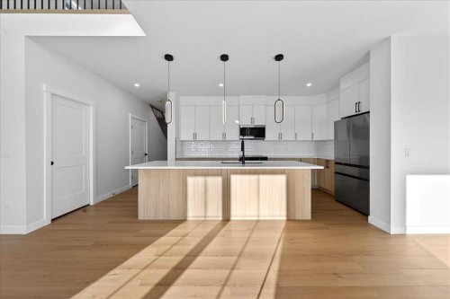 7 Lakewood Way, Strathmore, AB - Indoor Photo Showing Kitchen With Upgraded Kitchen