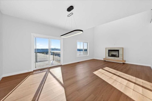 7 Lakewood Way, Strathmore, AB - Indoor Photo Showing Living Room With Fireplace