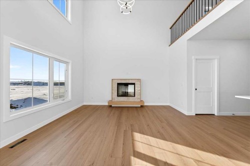 7 Lakewood Way, Strathmore, AB - Indoor Photo Showing Other Room With Fireplace