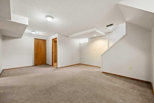 2719 Chalice Road Nw, Calgary, AB - Indoor Photo Showing Other Room