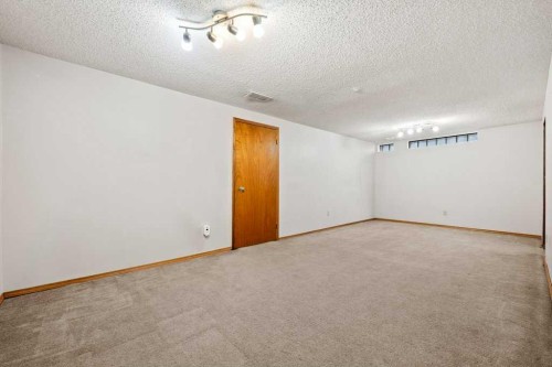 2719 Chalice Road Nw, Calgary, AB - Indoor Photo Showing Other Room