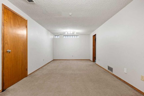 2719 Chalice Road Nw, Calgary, AB - Indoor Photo Showing Other Room
