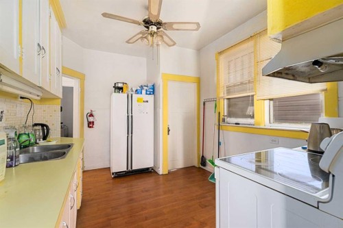 216 15 Avenue Nw, Calgary, AB - Indoor Photo Showing Kitchen With Double Sink